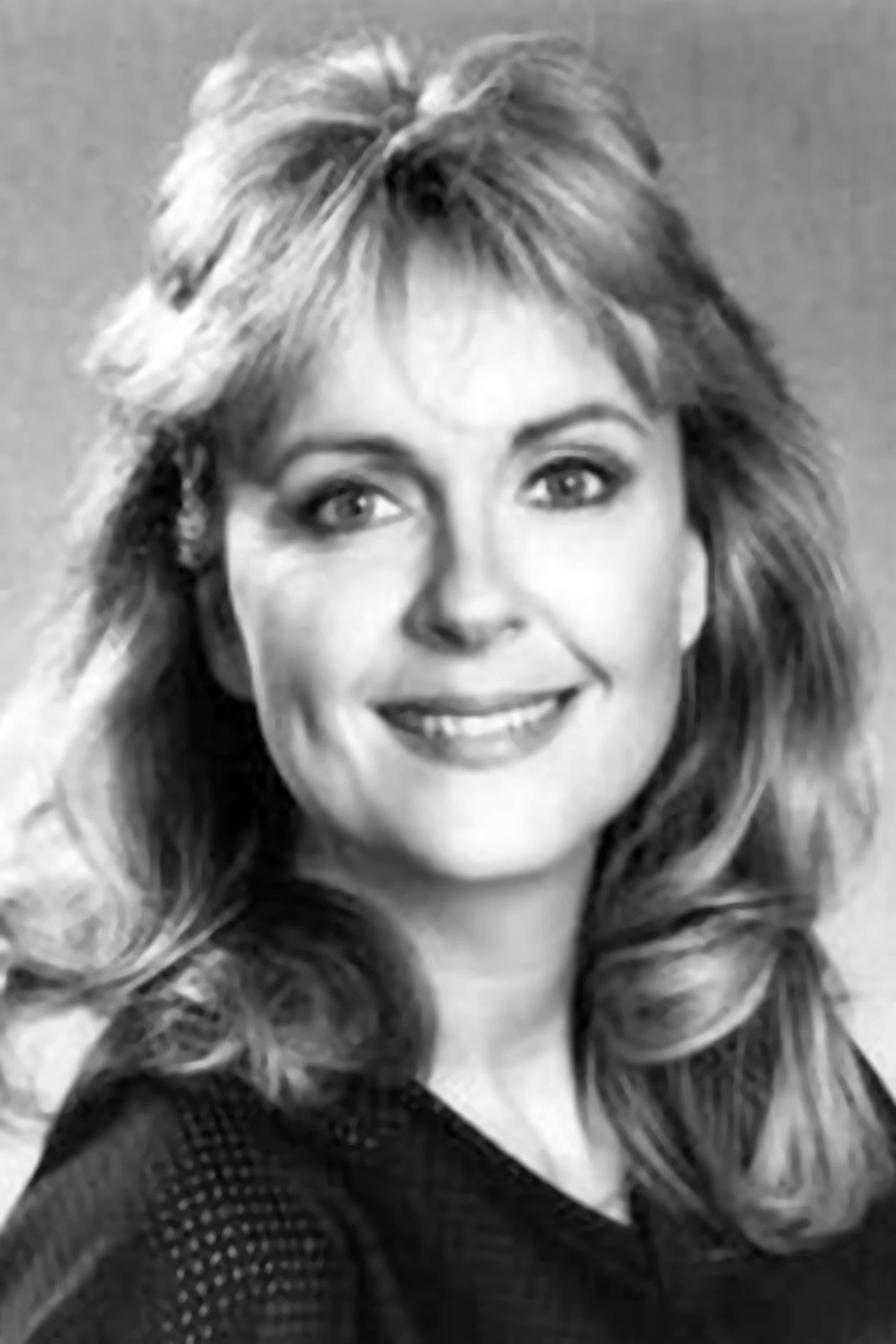 Deborah Harmon | TV Newscaster (uncredited)
