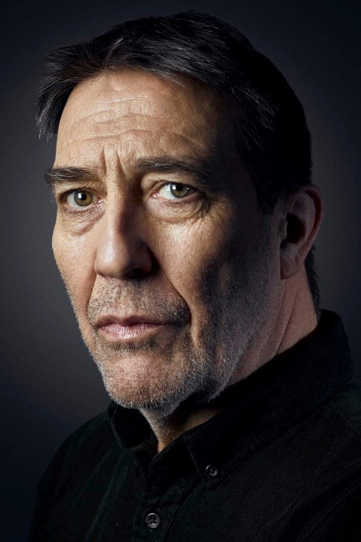 Ciarán Hinds | Priest (uncredited)