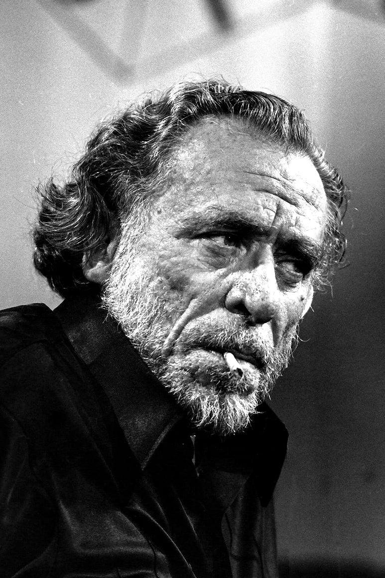 Charles Bukowski | Bar Patron (uncredited)