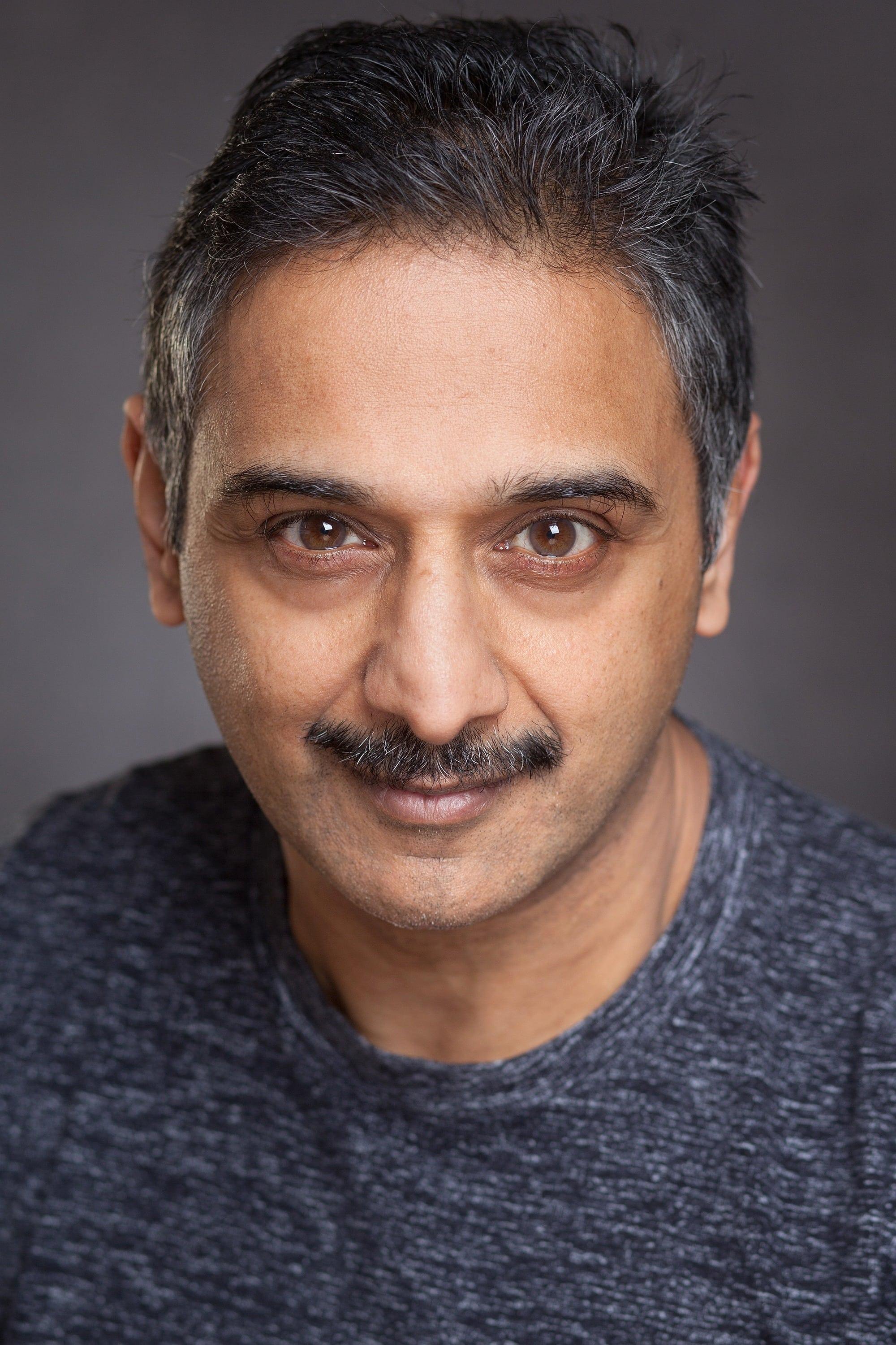 Ash Patel | Middle Aged Asian Man