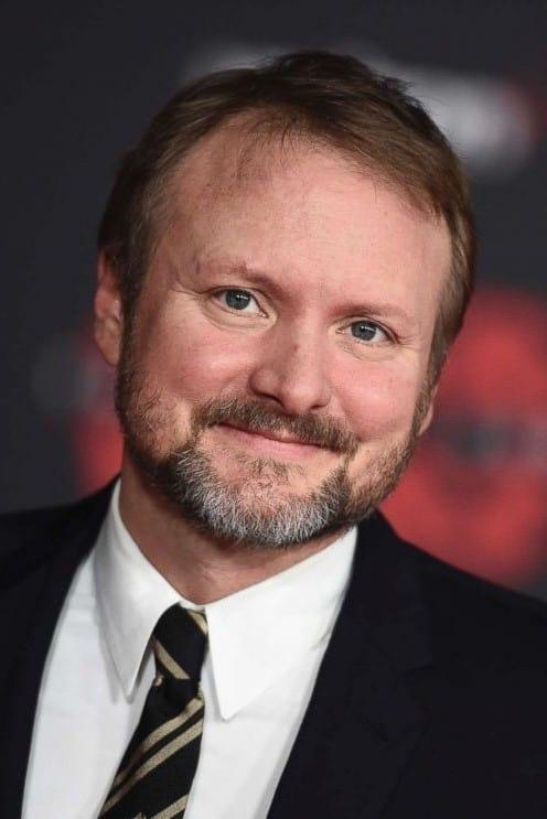 Rian Johnson | Party Guest (voice) (uncredited)